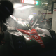 The No. 8 goes into the garage still smoking a bit from hybrid problems encountered during the race. Photo credit: David Vincent/AP Images